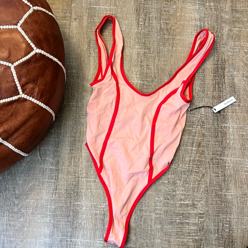 NWT Pink Body Suit with Red Stitching
